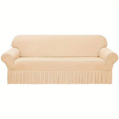 Elastic waterproof sofa slipcover with skirt for all seasons, ideal furniture protection for home and office.