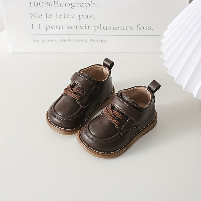 Kids British-style striped tassel crib shoes for toddlers, with lightweight microfiber synthetic upper and TPR sole for all-season wear in spring and fall.