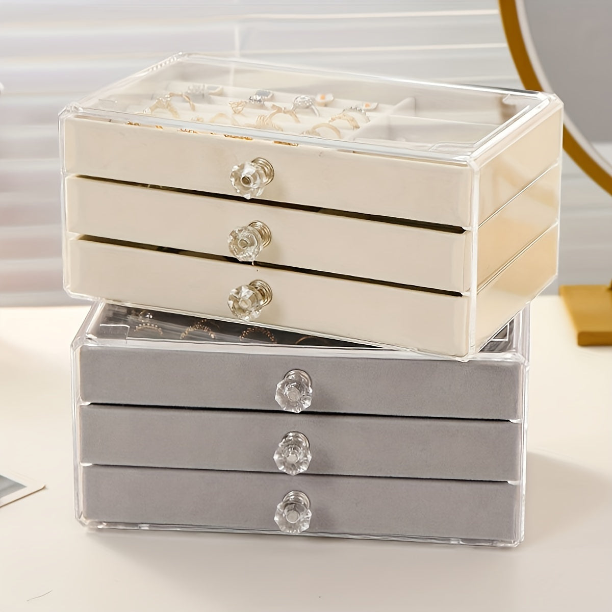 1 large drawer jewelry box with 3 layers for storing earrings, rings, necklaces, bracelets, and pendants on a desktop.