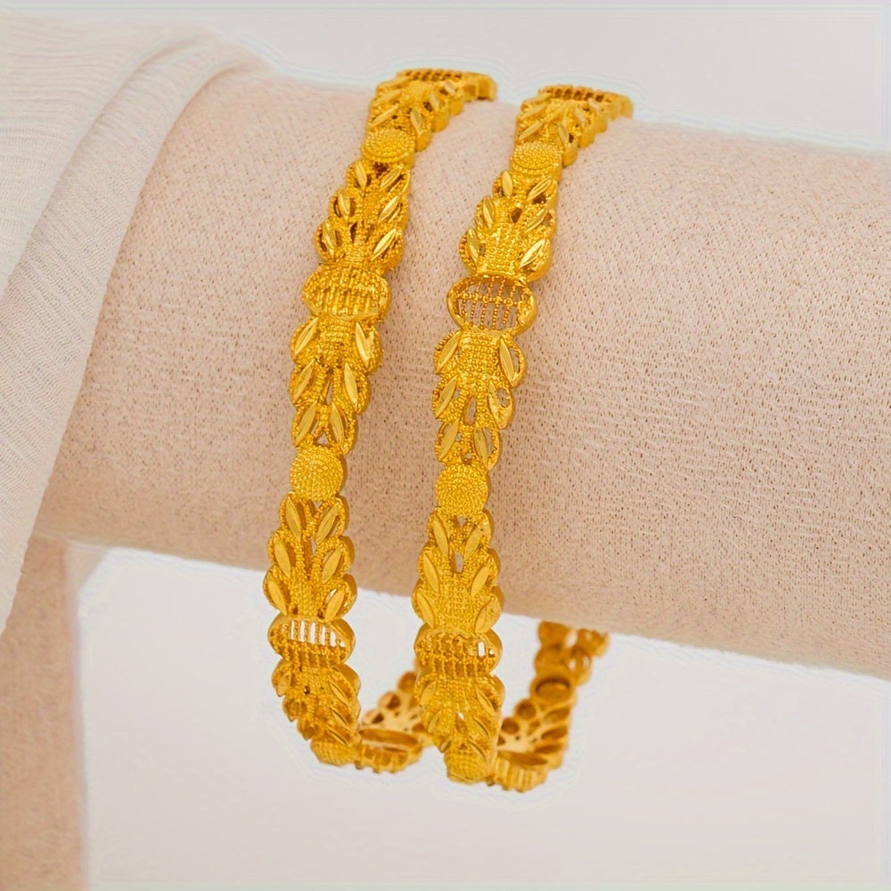 Set of 4 fashionable bangles designed for women. Made of alloy with an open cuff style, these bracelets exude a cute and luxurious look. They are free of any plating, making them perfect for everyday wear and as gifts for any occasion. Suitable for all