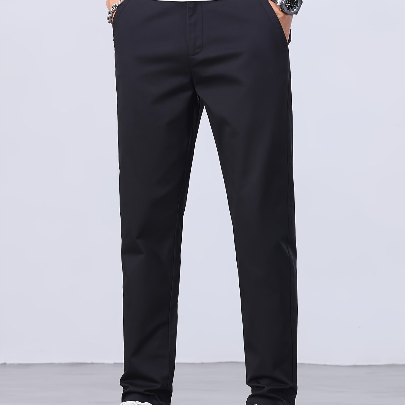 1 Men's all-season casual pants in caramel color, made of cotton blend with slight stretch and regular fit, featuring mid waist, pockets, zipper fly, and woven work style for weekend casual.