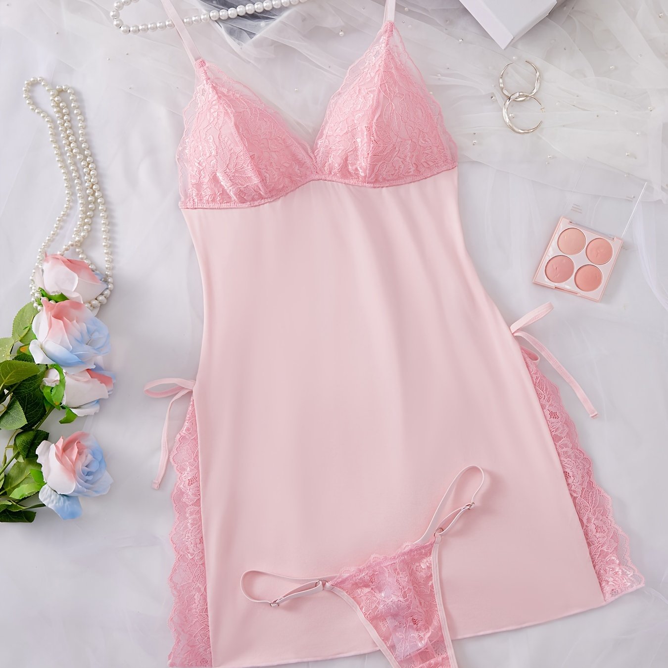 Women's sexy nightdress and panty set with V-neck, thin shoulder straps, and fashionable charm design.