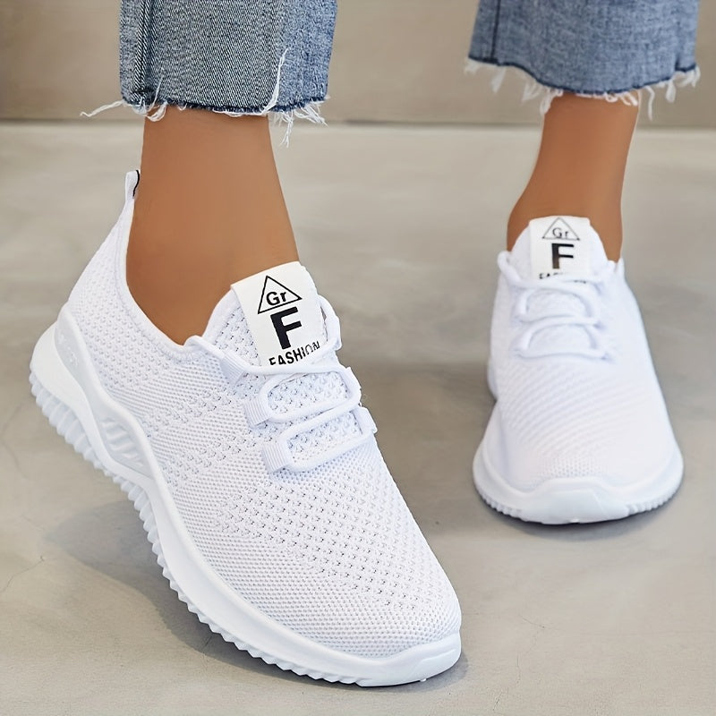 Women's comfortable low top running shoes with breathable knit fabric and thick soles for outdoor activities.