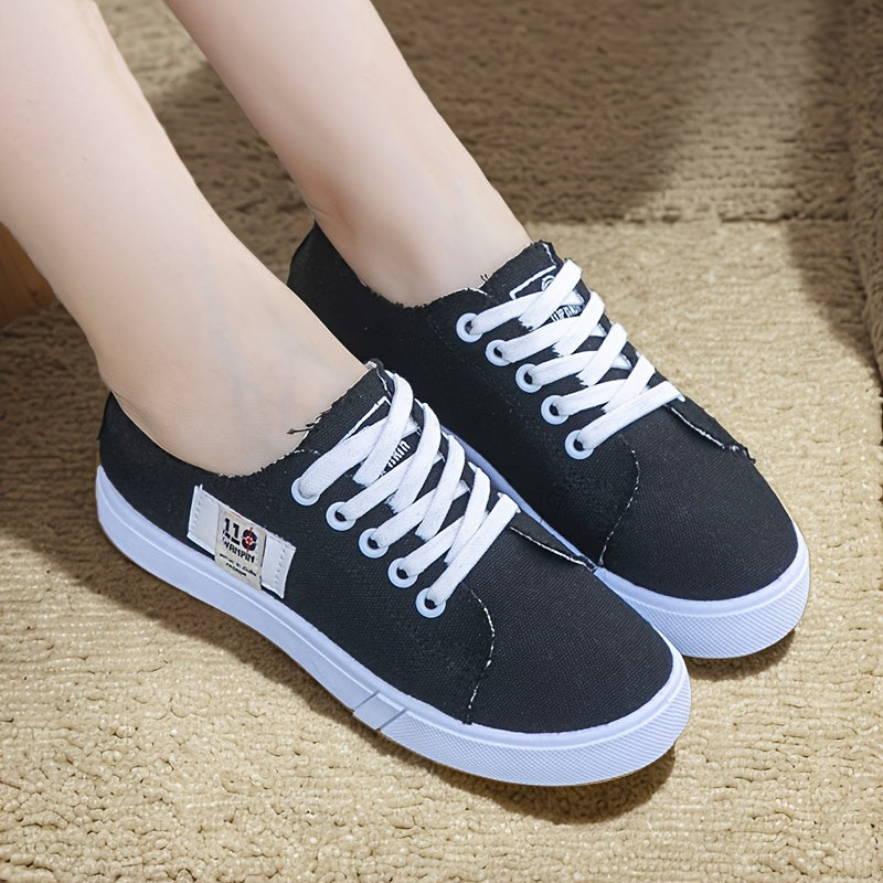 1 pair of women's casual canvas sneakers with round toe, lace-up design, lightweight rubber sole, and fabric insole.