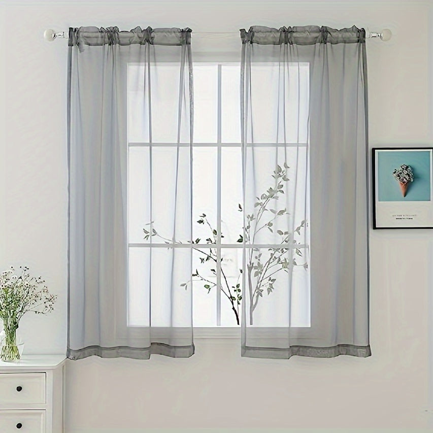 Two panels of sheer curtains with a basic rod pocket design, perfect for adding a touch of elegance to your bedroom, office, living room, yard, kitchen, or any other space in your home.