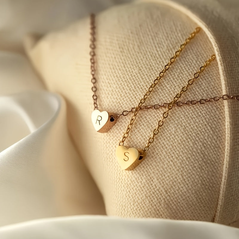 Stylish and chic, this Heart Initial Necklace is custom-made for girls. Crafted from durable stainless steel, it is perfect for any occasion, whether it be a casual day out or a fancy party. This makes a thoughtful gift for both friends and mothers