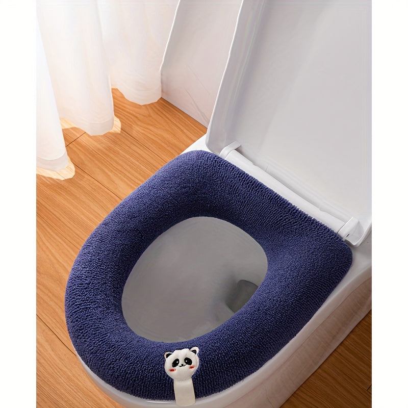 Thickened toilet seat cover with handle in cute cartoon solid colors, soft and comfortable.