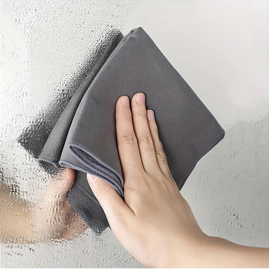 Magic Cloth Microfiber Wipes available in a 5-pack or 10-pack, featuring a sleek contemporary oblong shape. Made with non-woven fabric, these wipes are multi-functional with no water marks and excellent water absorption. Perfect for cleaning in the