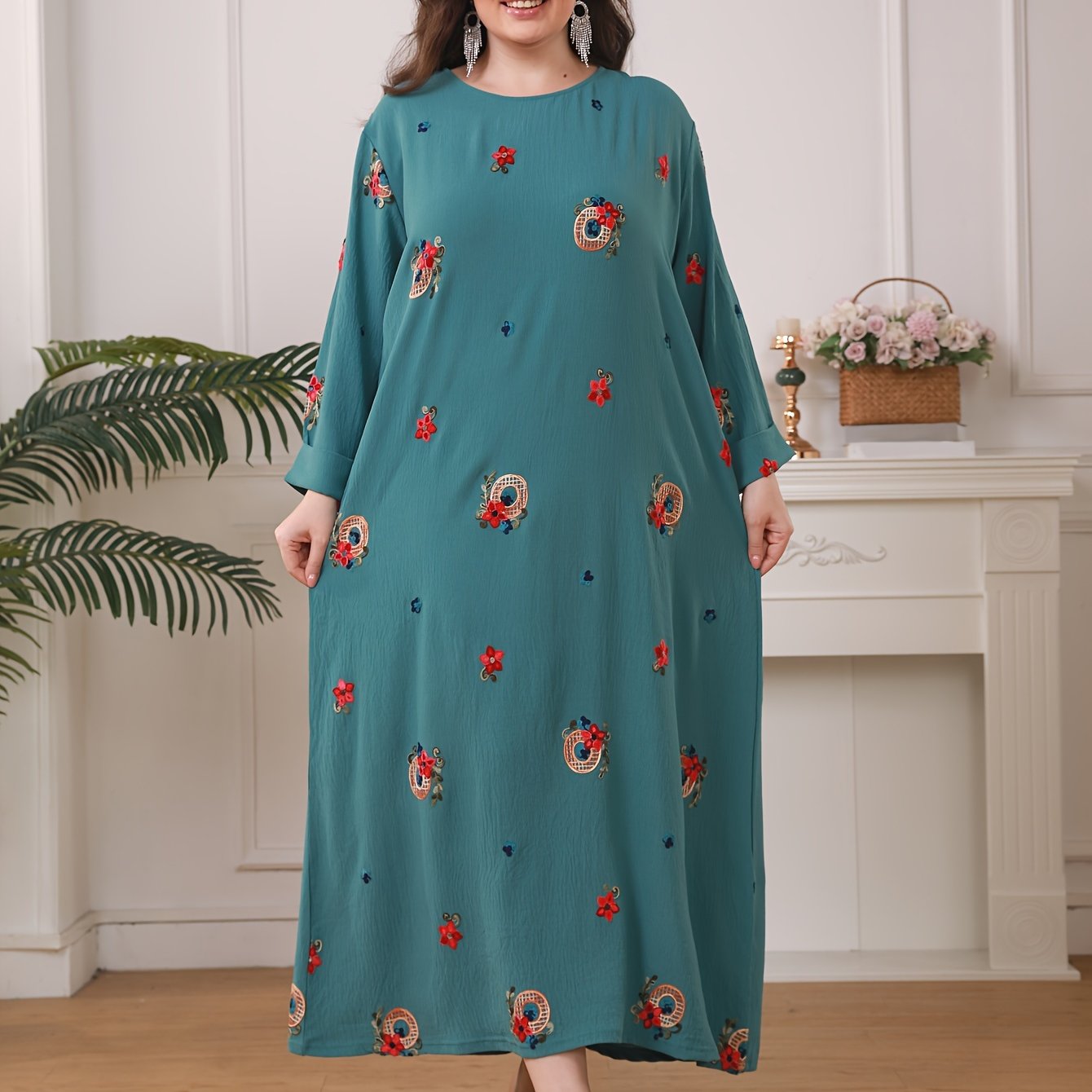 Elegant floral print women's plus size abaya with long sleeves and loose fit in traditional Middle Eastern style.