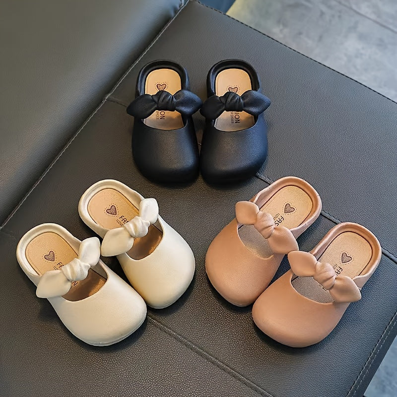 Stylish bowknot slip-on sandals for girls, perfect for indoor and outdoor wear.