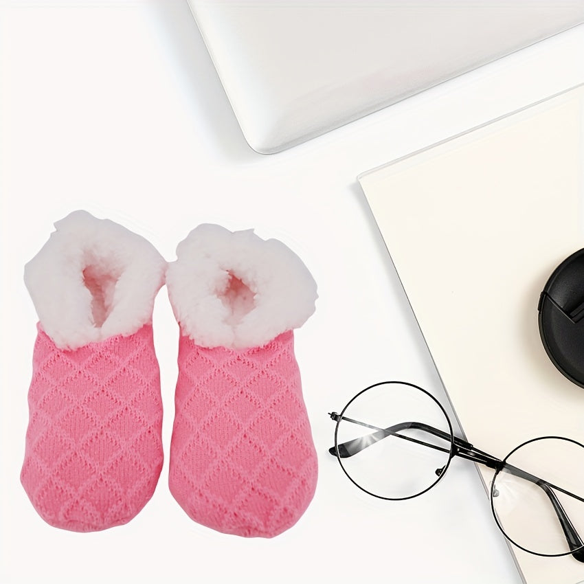 Women's warm non-slip coral fleece floor socks with plush knitted design.