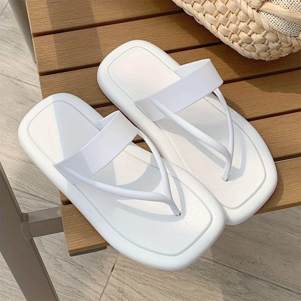 Women's solid color flip flops with soft PVC sole, lightweight and non-slip for casual seaside wear.