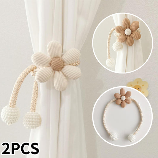 Elegant set of two curtain tiebacks featuring charming cartoon flowers and white faux pearl accents. No drilling required, making them ideal for bedrooms, living rooms, and children's rooms.