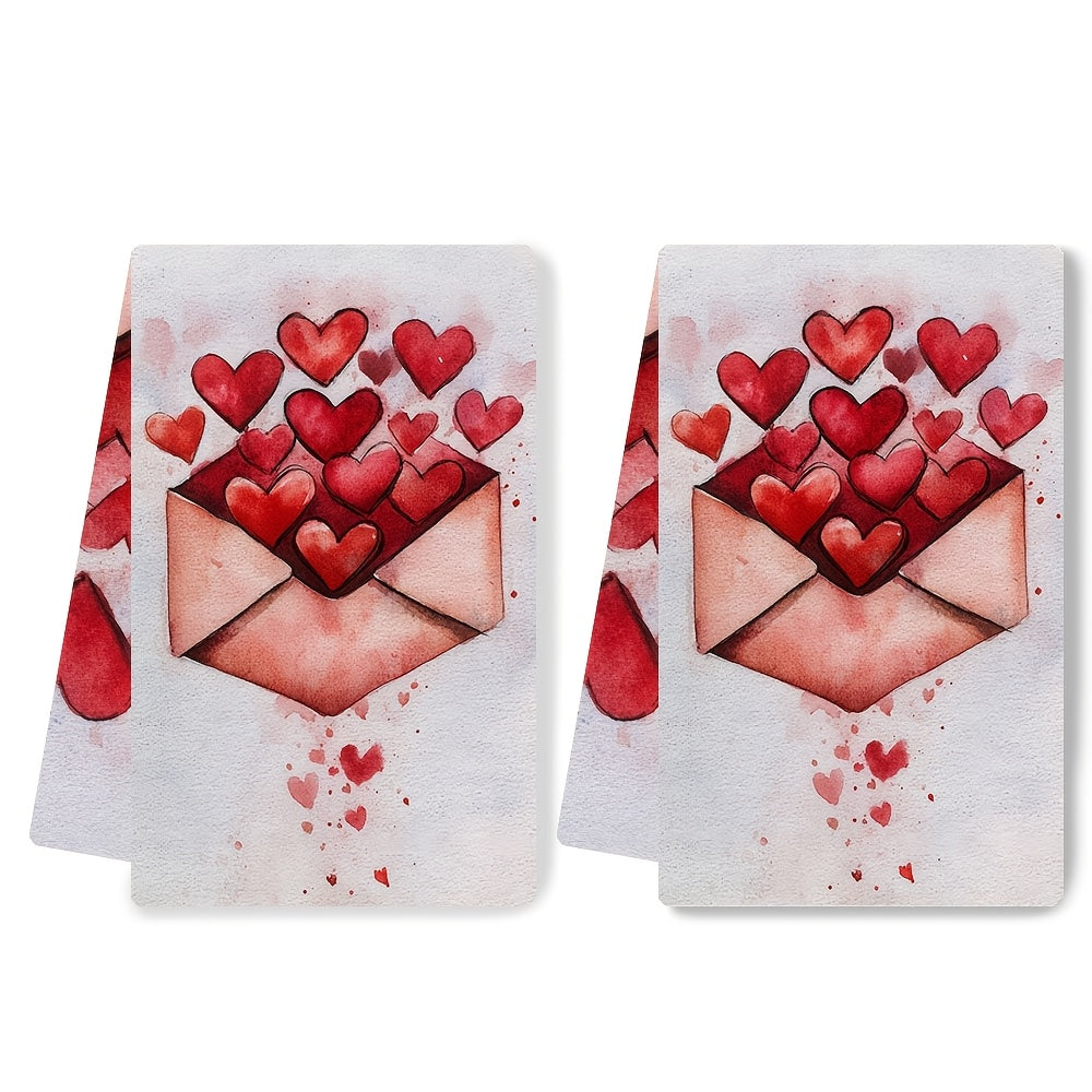 Two romantic Valentine's Day kitchen towels are available for purchase. These ultra soft and highly absorbent polyester dish hand towels measure 40.64x60.96 cm and feature a heart envelope design. They are machine washable and are ideal for holiday decor