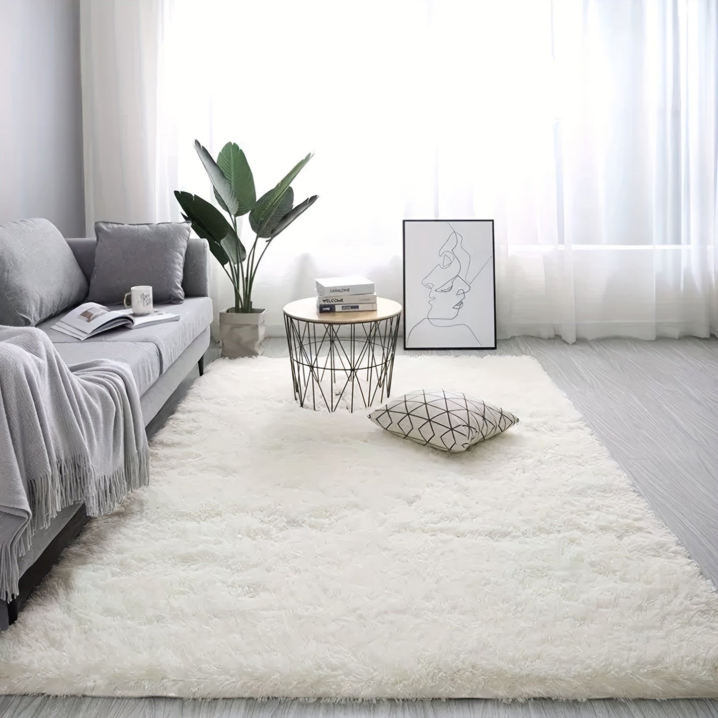 1 piece of an ultra-soft plush rug in white for a large area, featuring a non-slip design and fluffy shaggy texture. This waterproof shaggy throw rug is perfect for the living room, bedroom, nursery, game room, dormitory, or teenage room decoration. Add