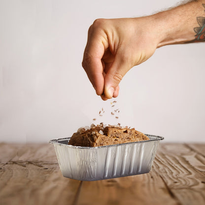 Set of 50 mini loaf pans perfect for baking bread, made of disposable aluminum foil material. Each pan weighs 453.59g and measures 15.24cm X 8.89cm X 5.08cm.