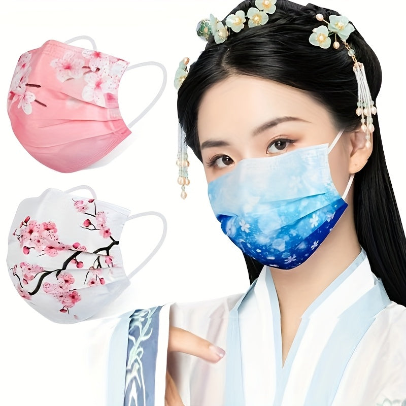 Disposable fashion face covering for adults, featuring 30 pieces of 3-layer breathable face scarf masks made of woven polypropylene. These masks are elastic, sun-proof, and come in a variety of floral and starry sky patterns. They have wide ear loops