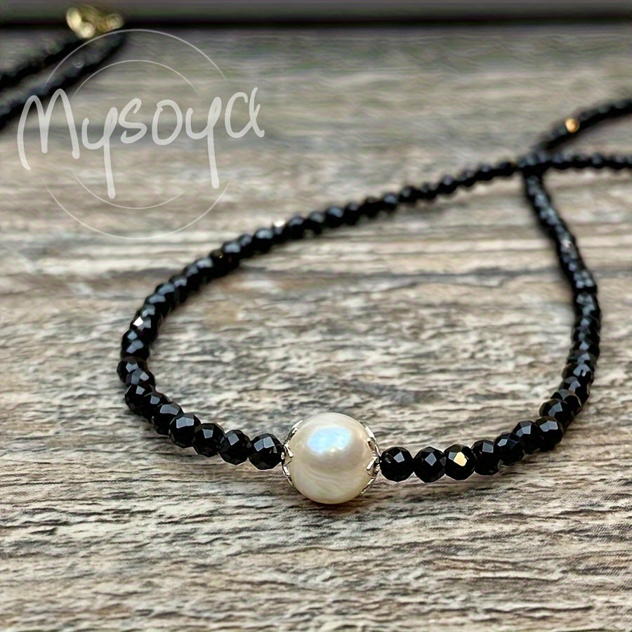 This exquisite Black Onyx and Freshwater Pearl Necklace is lovingly handcrafted and is the ideal gift for anyone. Whether it's for her or him, this timeless piece is perfect for daily wear or special occasions like weddings. The Black Onyx gemstone is