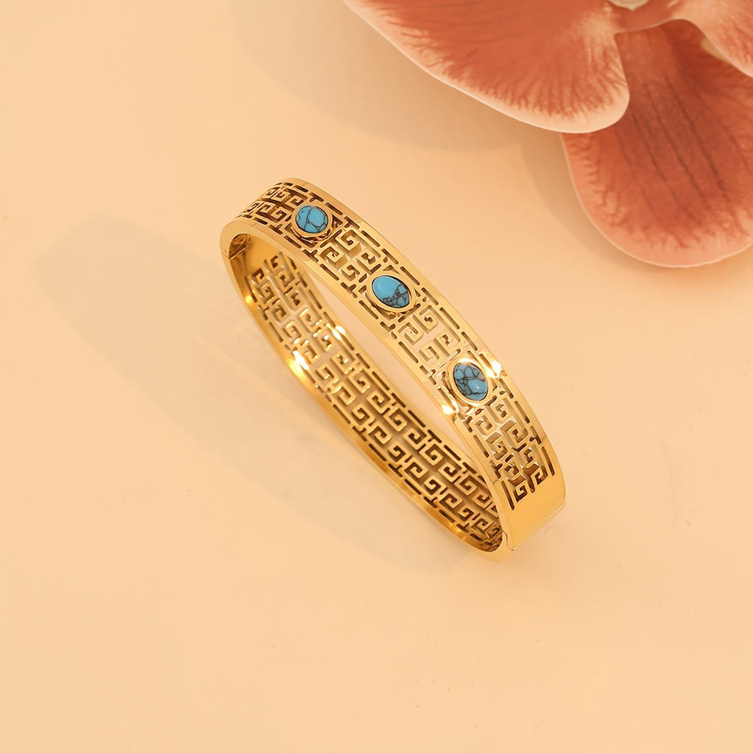 1pc of Vintage Style 18K Golden Plated Stainless Steel Bracelet featuring Turquoise Inlay and Hollow Pattern Design, specially designed for women as a Daily Wear Jewelry piece. This bracelet is the perfect Valentine's Day Gift.