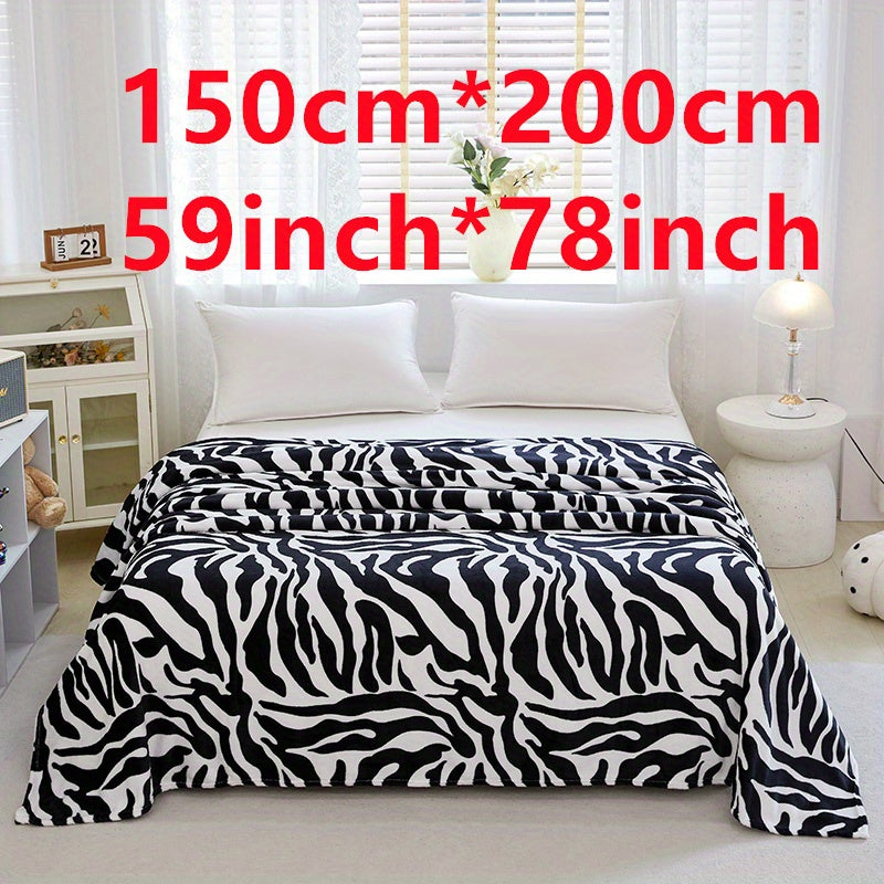 Zebra Patterned Blanket, Luxuriously Soft Throw Blanket Ideal for Snuggling Up on the Couch, Sofa, Office, Bed, Camping or Travel. The perfect multi-purpose gift blanket that can be used in all seasons.