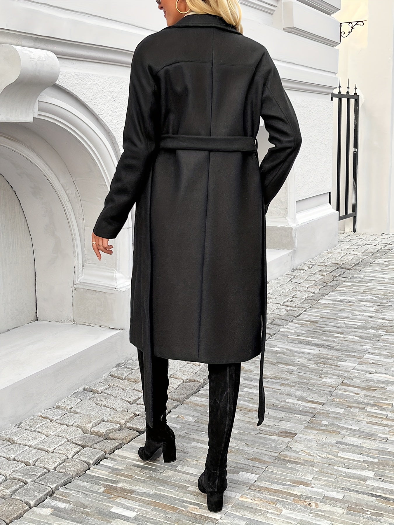 Button front belted coat with elegant lapel neck and long sleeves, perfect for fall and winter. Women's clothing.