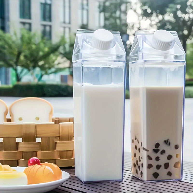 1pc of Creative Milk Carton Water Bottles made of transparent plastic, available in 500ml or 1000ml sizes. These reusable bottles feature a leak-proof screw cap and are ideal for carrying milk, juice, and tea for home or outdoor use.