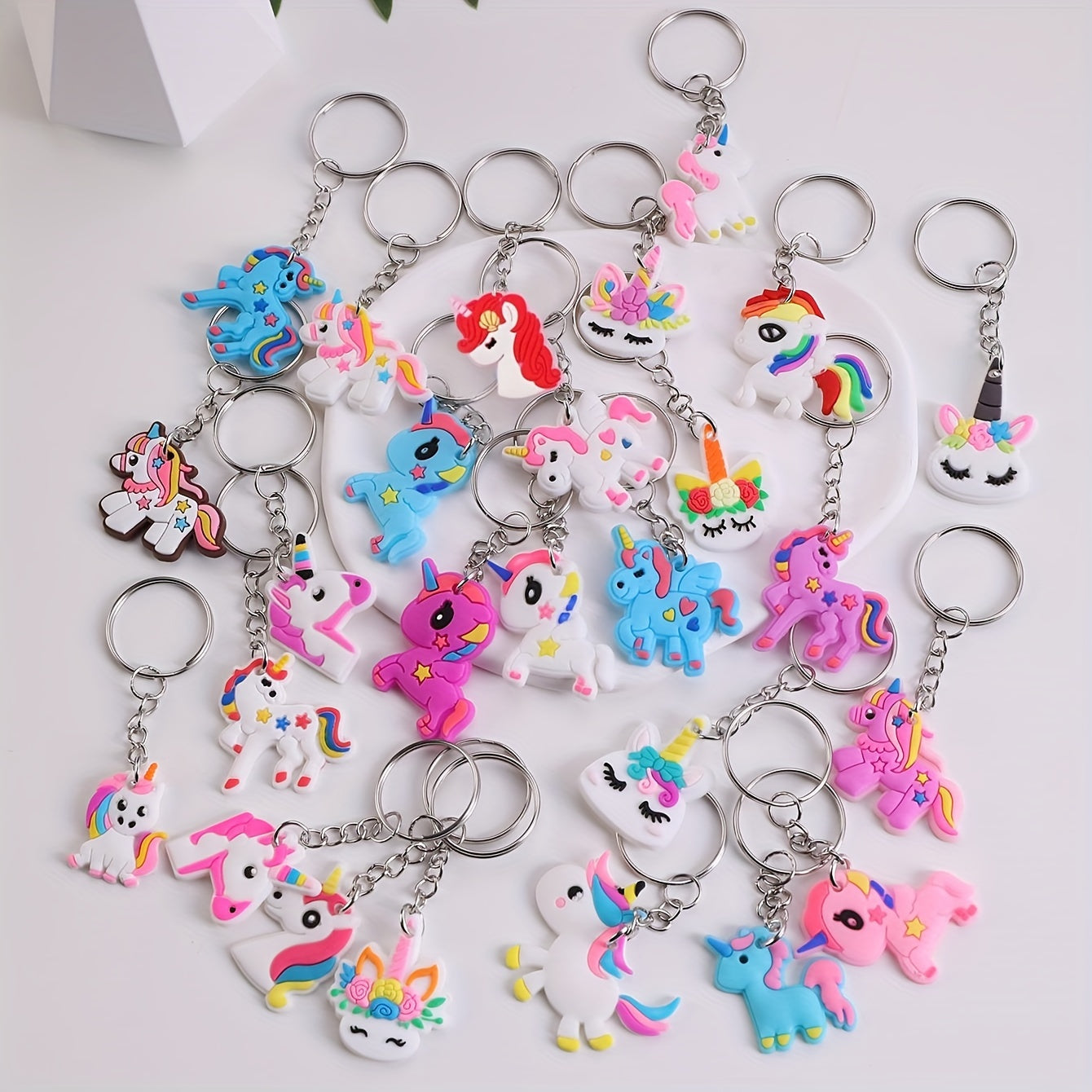 26 DIY cartoon unicorn keychains made of PVC material, perfect for adding a touch of whimsy to your lady's bag or keyring. Ideal for birthday gifts and featuring an adorable animal theme.