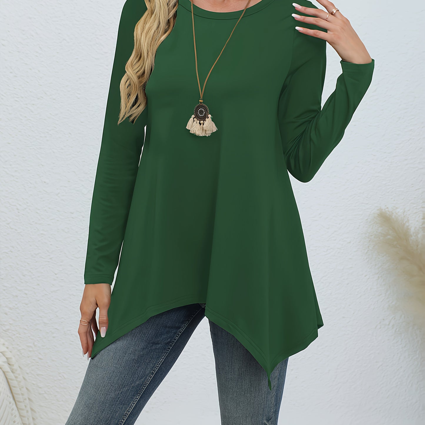 Comfortable lounge tops for women, including round neck long sleeve tunic with asymmetric hem.