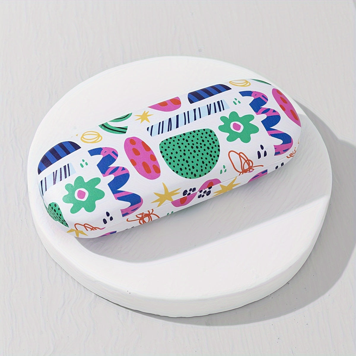 Protective storage box for glasses and sunglasses featuring colorful printed designs and fun patterns, designed specifically for ladies. The hard shell case ensures your eyewear stays safe and stylish.