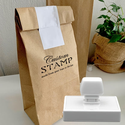 Large, personalized business stamp with custom logo and unique design, ideal for small businesses and office use. Made of ABS material with black ink.