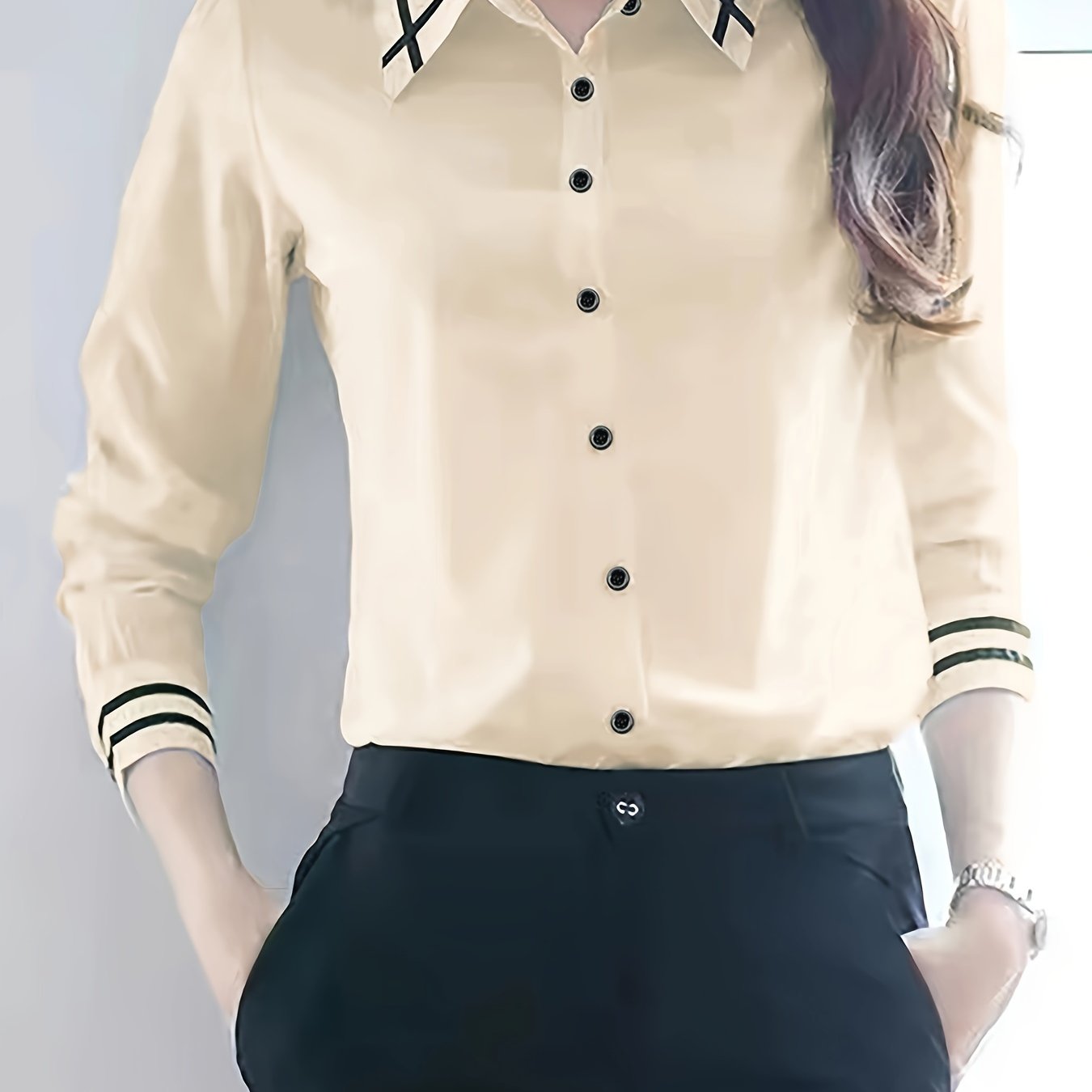 Classic beige dress shirt for women made of polyester with black and white striped trim. Long sleeves, button-up, and machine washable. Perfect for office or casual spring/summer wear.