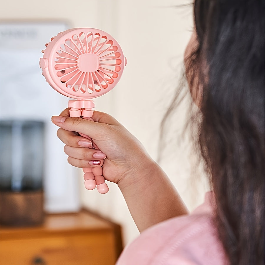 Compact and versatile, the Octopus-Shaped LED Light Mini Fan is a portable and wearable fan with a flexible tripod stand that can be easily attached to strollers, outdoor gear, tables, or used indoors. Made of durable plastic material, this fan is