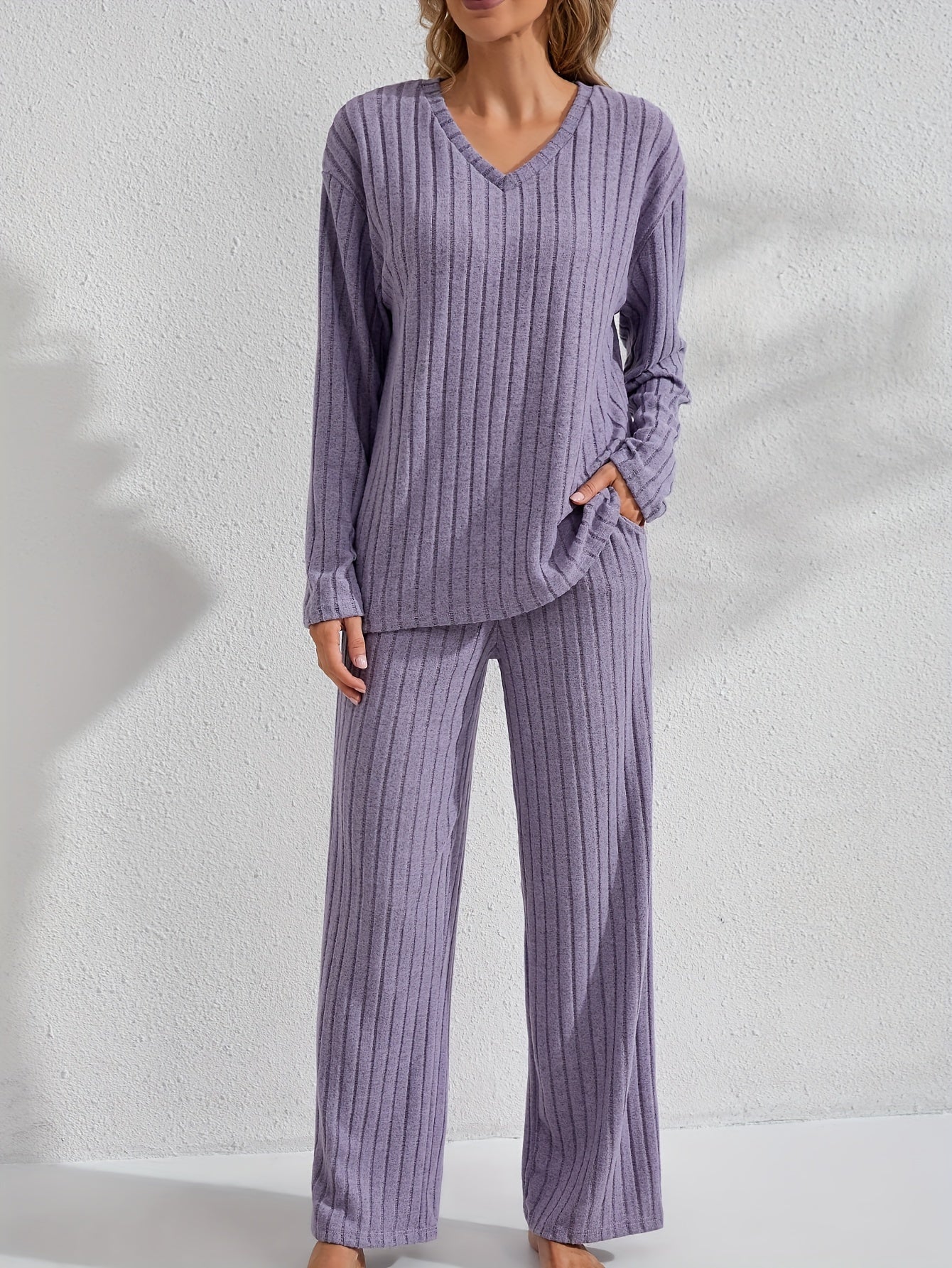 Women's cozy and stylish long sleeve top and pants set for autumn and winter.