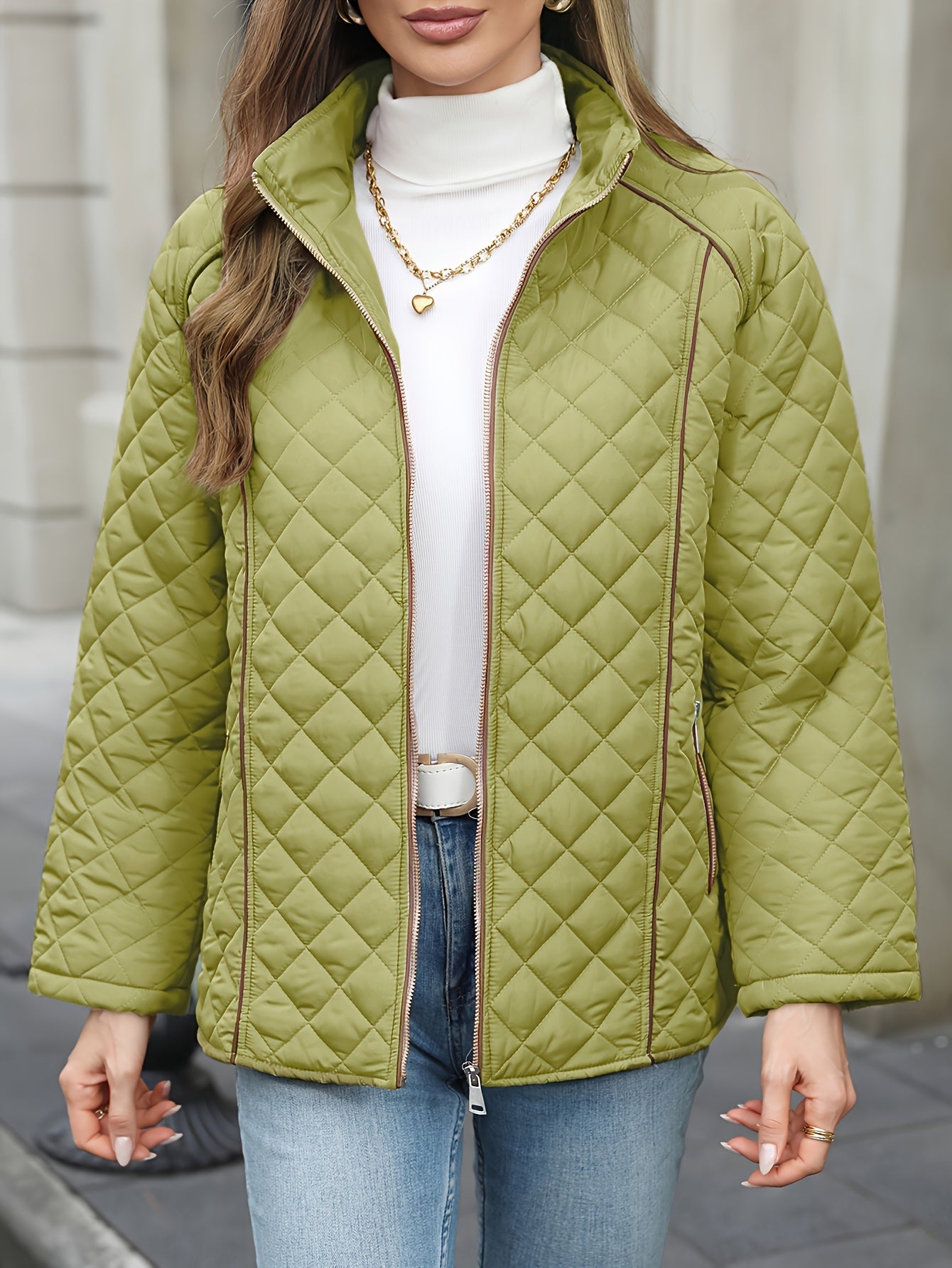 Women's plus size casual quilted outerwear with stand collar, zipper, and long sleeves. Made of 100% non-stretch solid woven polyester for fall/winter.