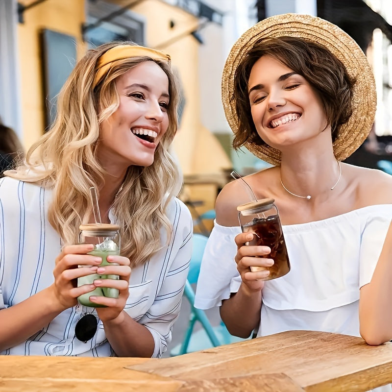 Set of 4 high borosilicate drinking cups with a 550ml water cup, bamboo lid, glass straw, and straw brush. Each cup holds approximately 603.8 grams, suitable for various drinks in