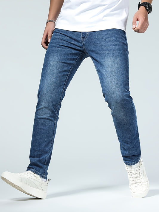 Luxurious men's casual jeans with a slim straight fit and high-quality fabric, perfect for a light business casual look.