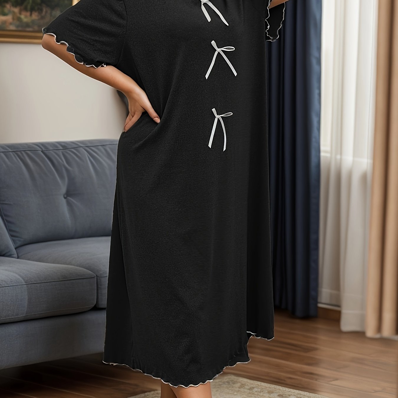 Plus size casual sleep dress with bow decor and short sleeves.