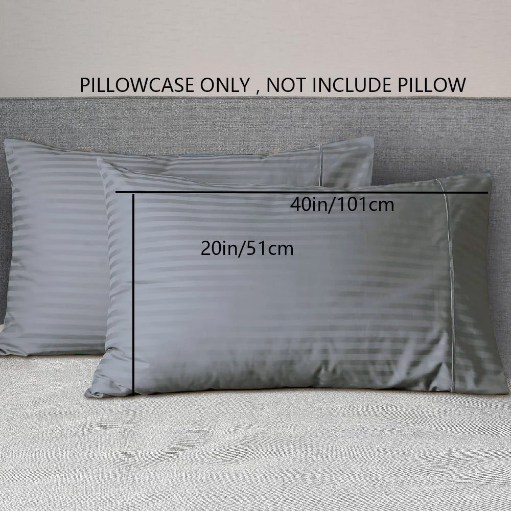 A pair of striped pillowcases made from soft, breathable woven polyester. These pillowcases are machine washable and have a sanded finish for added comfort. They do not include a pillow insert and are made from non-printed lightweight fabric with a 90gsm