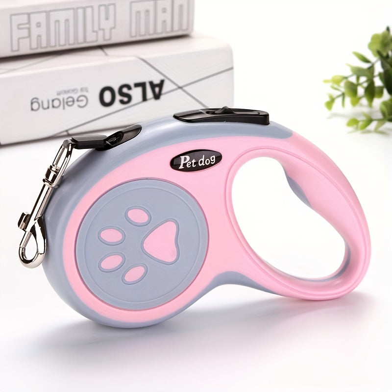 Durable polyester retractable dog leash featuring paw print design, ideal for dogs. Easy to use and store.