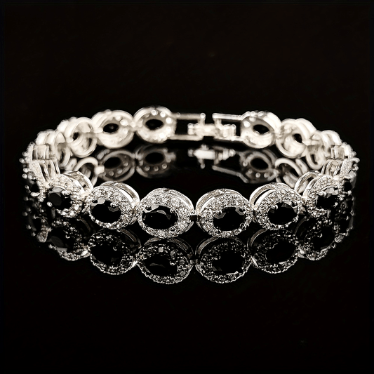 Vintage-inspired, this elegant oval cubic zirconia bracelet for women is the perfect accessory for weddings and parties. Give it as an ideal Valentine's gift.