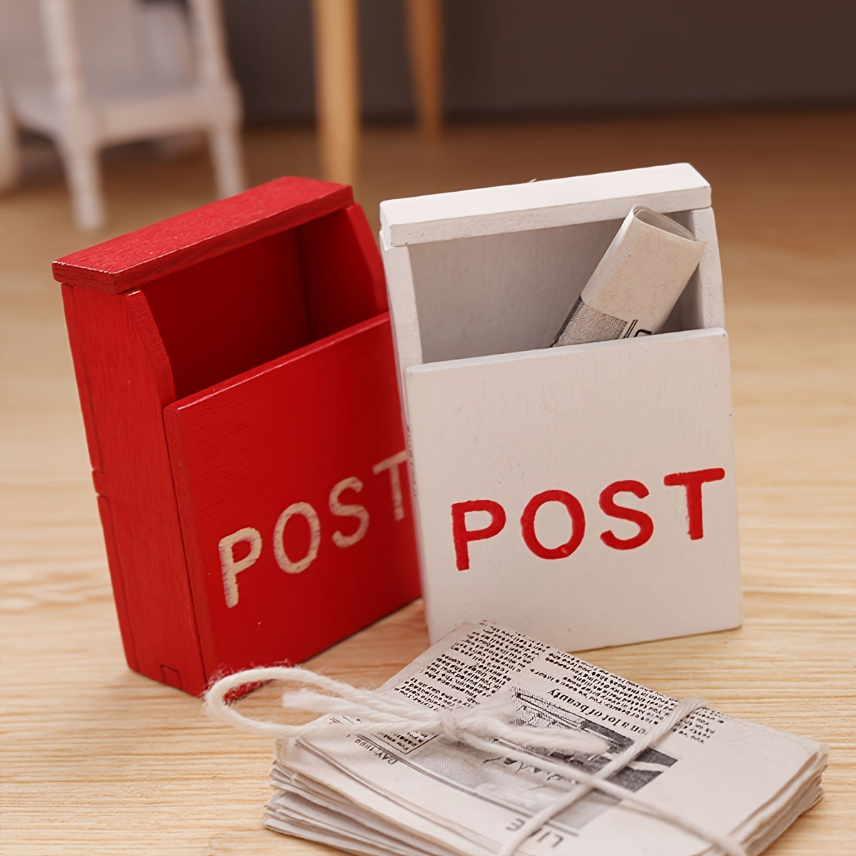 Red miniature wooden mailbox for 1:12 dollhouses with "POST" label, indoor use, no power required. Perfect for living room decor.