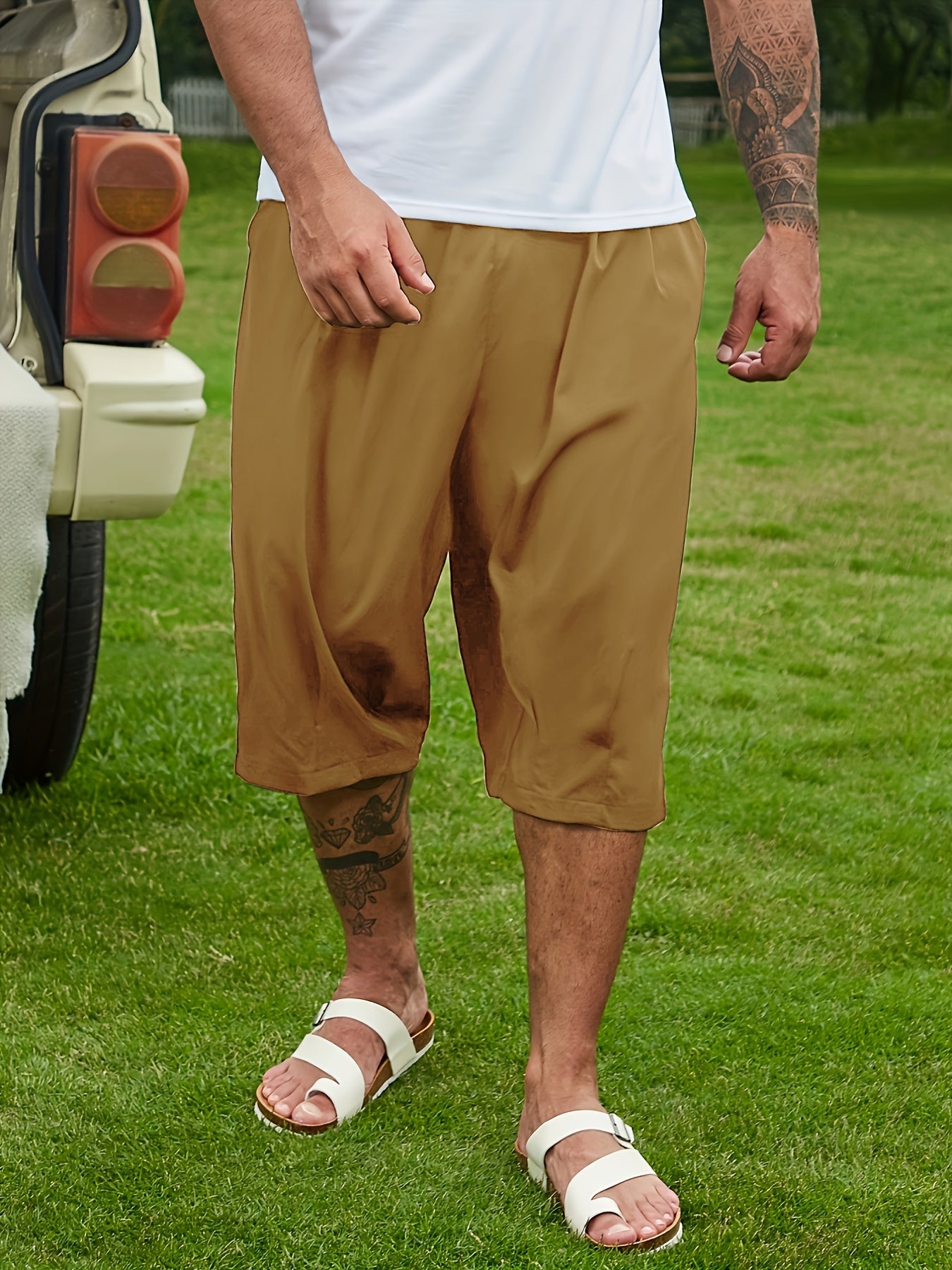 Breathable loose-fit solid capri pants for plus-size men, perfect for summer.