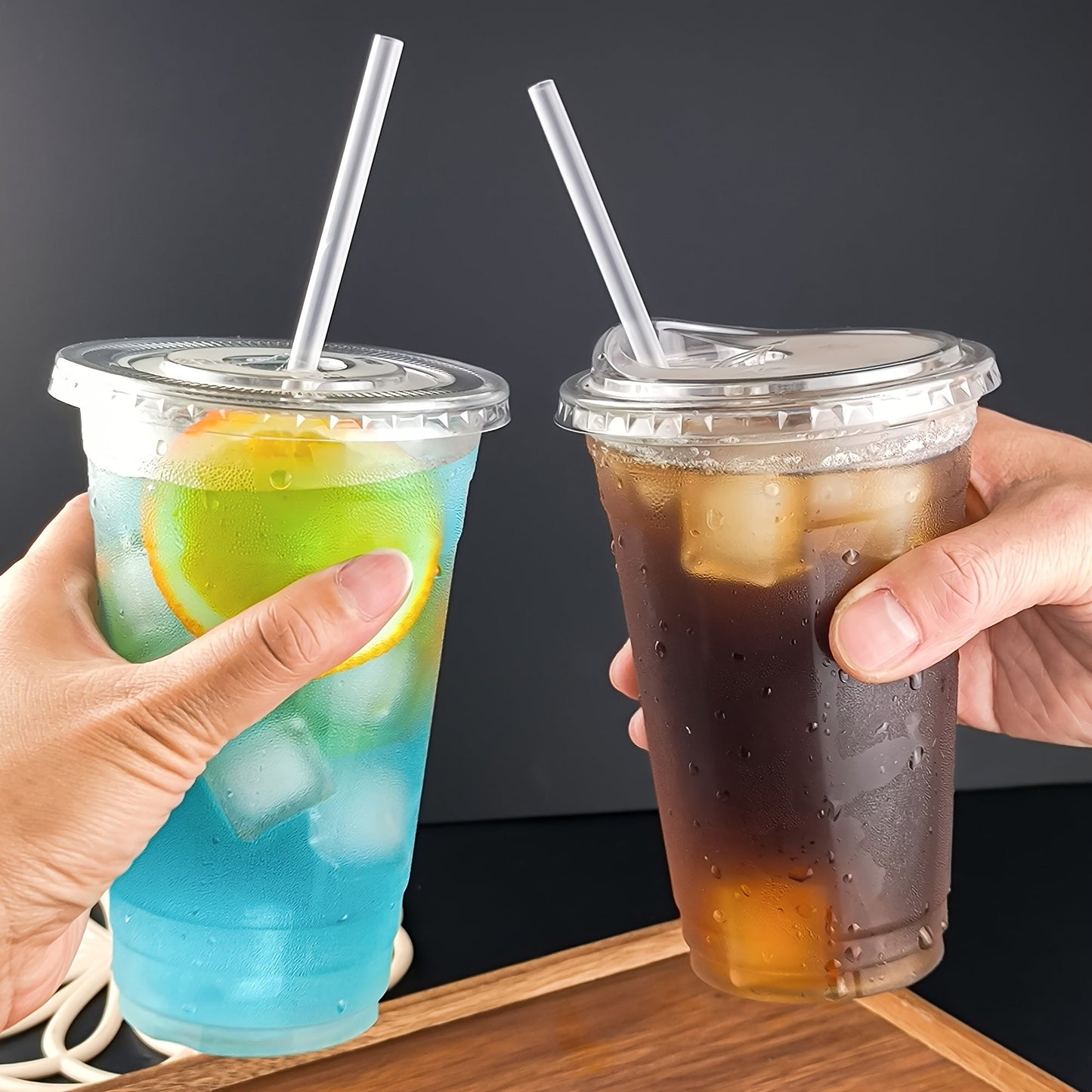 Get 25 sets of 24oz clear plastic cups with lids and straws, made from PET material. These cups are perfect for iced coffee and cold drinks, great for summer, outdoor events, and on-the-go drinkware.