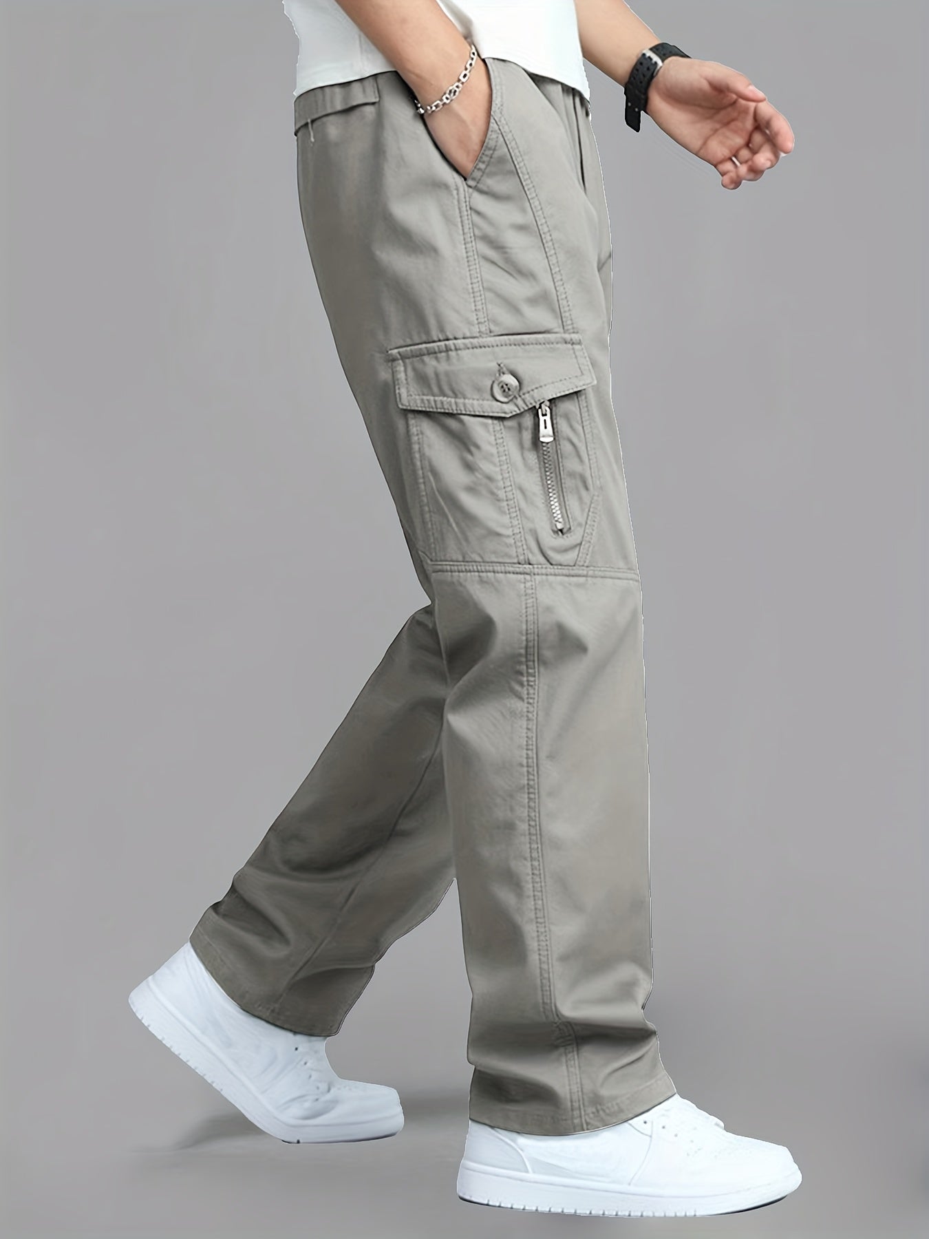 Casual cotton cargo pants for men, with solid color, multi-pocket design, loose fit, and non-stretch woven fabric. Ideal for daily wear in the Spring/Fall Collection.