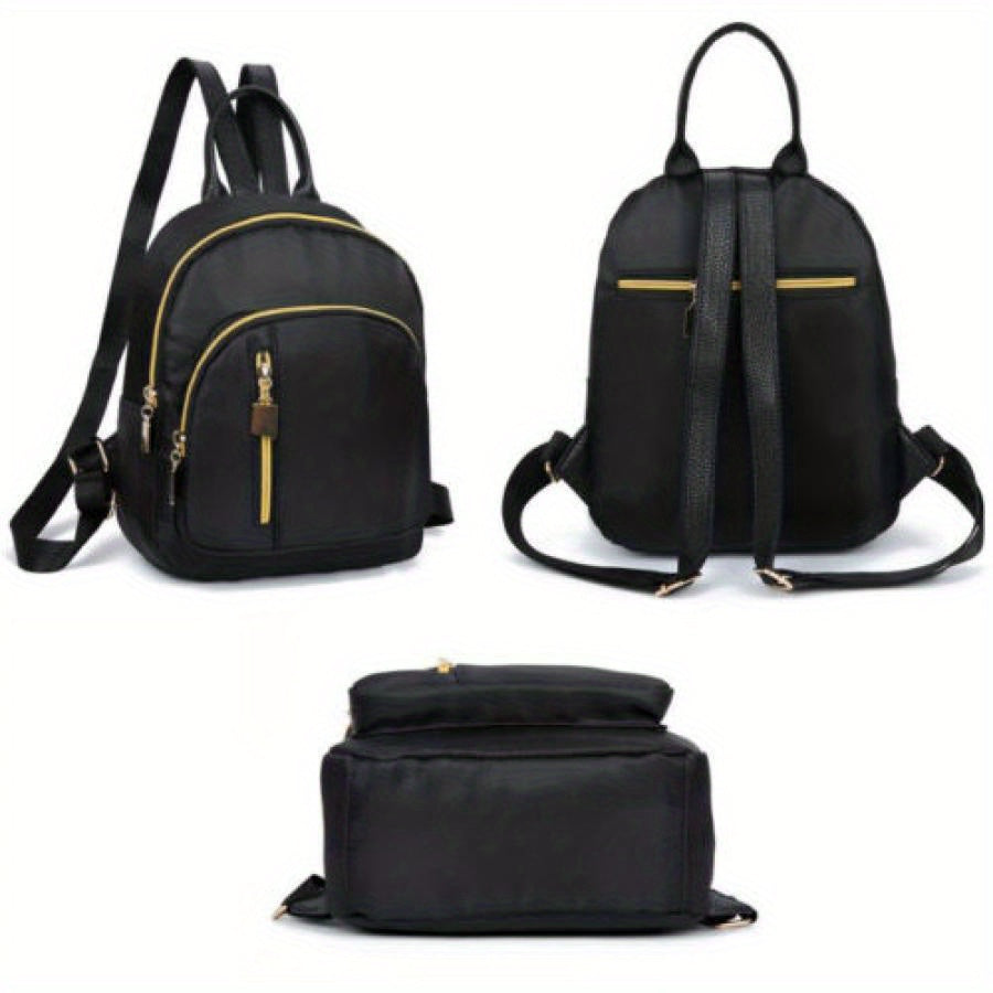 Spice Girl Chic Backpack in Black & Gold - Durable Polyester, Multi-Compartment, Zip Closure, Great for Travel & Daily Use.