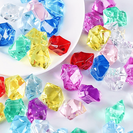 100 colorful and transparent acrylic diamond gems for aquariums and home decor, perfect for fish tanks and crafts.