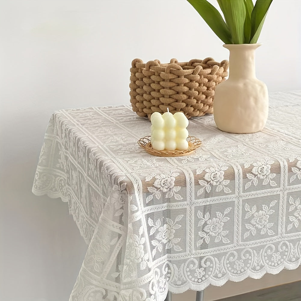 Elegant vintage lace tablecloth with floral cutwork, perfect for weddings, parties, and home decor. Made of durable machine-woven polyester.