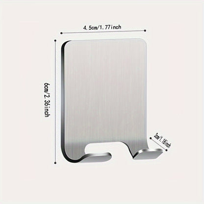 2 silver adhesive wall hooks for bathroom, bedroom, or kitchen. No drilling necessary. Made of stainless steel. Can hold shaver, hat, robe, or other items.