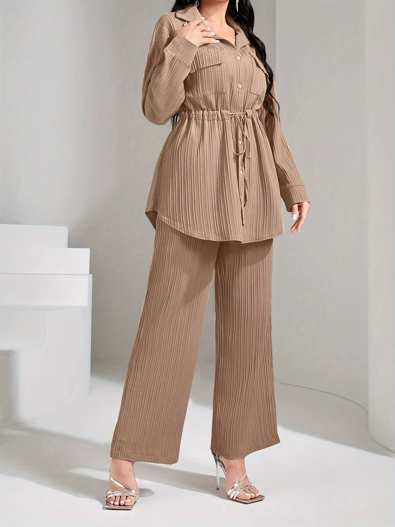 Women's casual polyester suit with lapel collar, solid color, woven fabric, long sleeve shirt, and wide leg pants for spring/fall season.