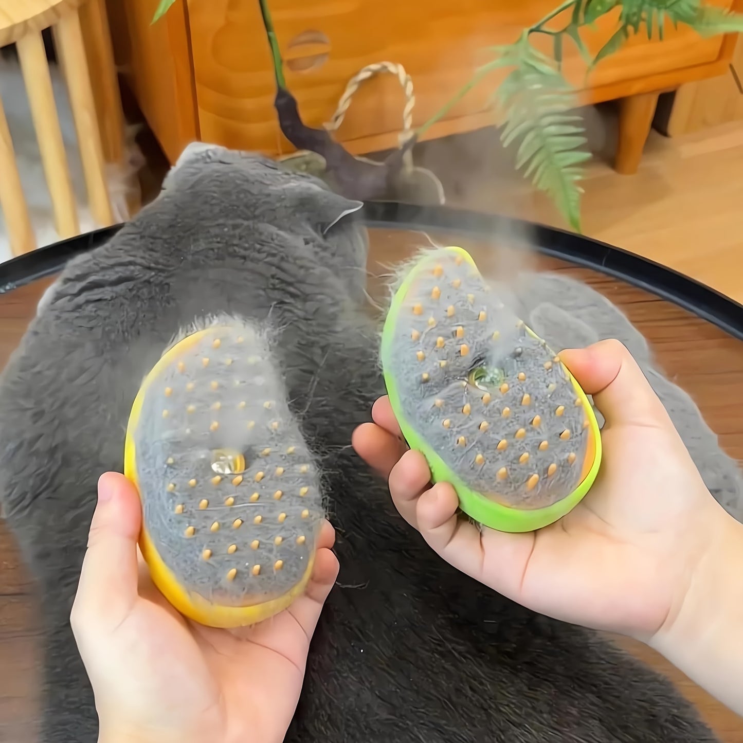 Self-cleaning Cat Steam Brush that removes tangled and loose hair, massages pets, and removes pet hair for both cats and dogs.